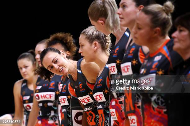 Bec Bulley of the Giants looks down the line at her team as they line up for the Indigenous round ceremony and anthem before the round 10 Super...