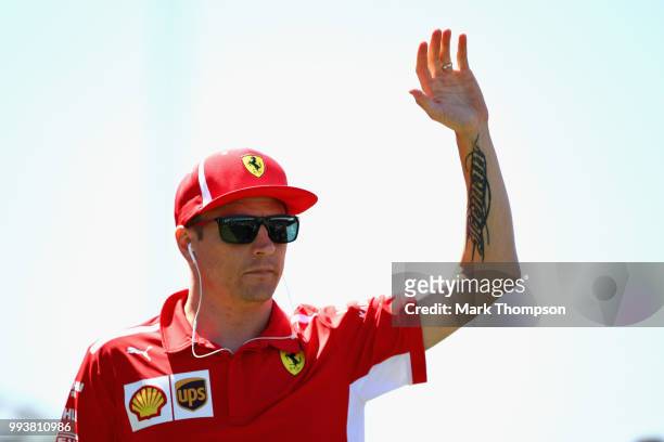 Kimi Raikkonen of Finland and Ferrari on the drivers parade before the Formula One Grand Prix of Great Britain at Silverstone on July 8, 2018 in...