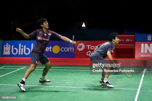 Takuto Inoue and Yuki Kaneko of Japan compete against Marcus Fernaldi Gideon and Kevin Sanjaya Sukamuljo of Indonesia during the Men's Doubles Final...