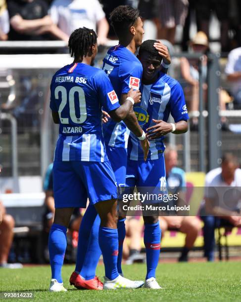 Valentino Lazaro, Davie Selke and Javairo Dilrosun of Hertha BSC celebrate during the game between Hertha BSC and Westfalia Herne at the...