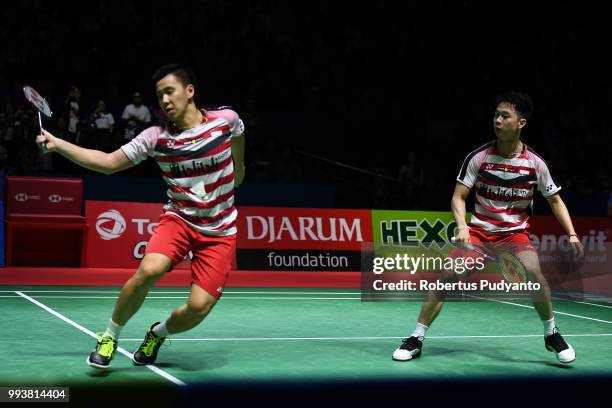 Marcus Fernaldi Gideon and Kevin Sanjaya Sukamuljo of Indonesia compete against Takuto Inoue and Yuki Kaneko of Japan during the Men's Doubles Final...