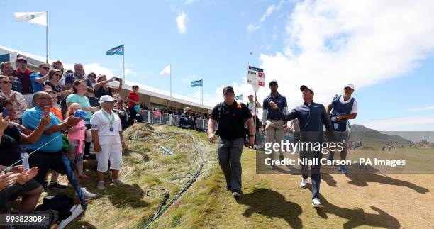 Northern Ireland's Rory McIlroy throws his ball into the crowd after his round on the 18th during day four of the Dubai Duty Free Irish Open at...