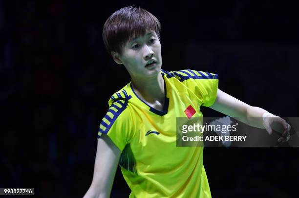 Chen Yufei of China plays against Tai Tzu Ying of Taiwan during the women's singles badminton final match at the Indonesia Open in Jakarta on July 8,...