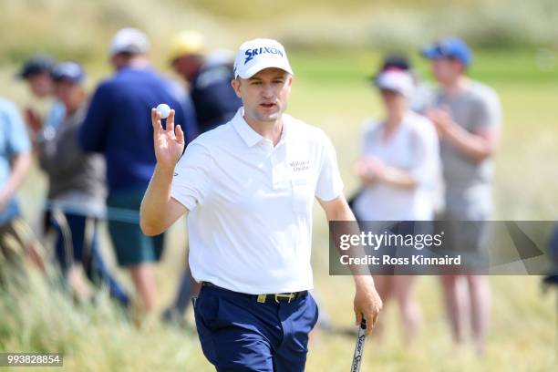 Russell Knox of Scotland acknowledges the crowd during the final round of the Dubai Duty Free Irish Open at Ballyliffin Golf Club on July 8, 2018 in...