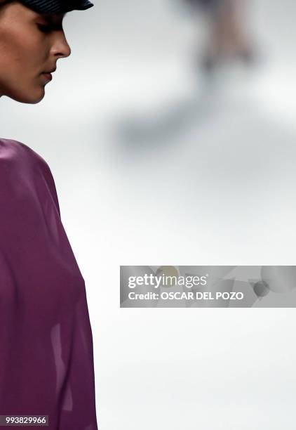 Model displays an outfit of Spanish designer Ulises Merida Spring/Summer 2019 collection during the Madrid's Mercedes Benz Fashion Week on July 08,...