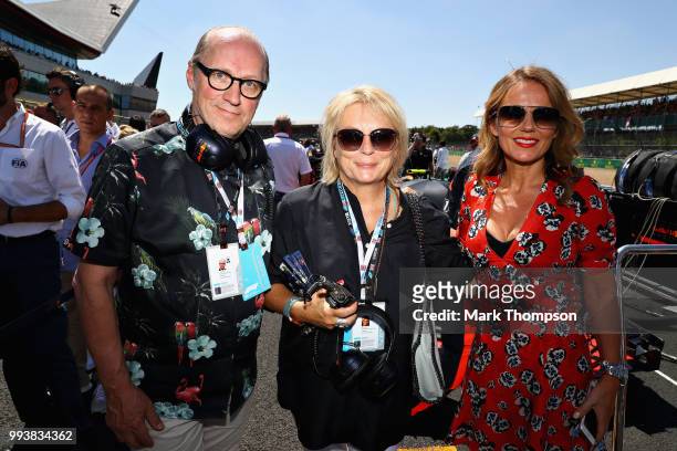 Ade Edmondson, Jennier Saunders and Geri Horner pose for a photo on the grid with Red Bull Racing before the Formula One Grand Prix of Great Britain...