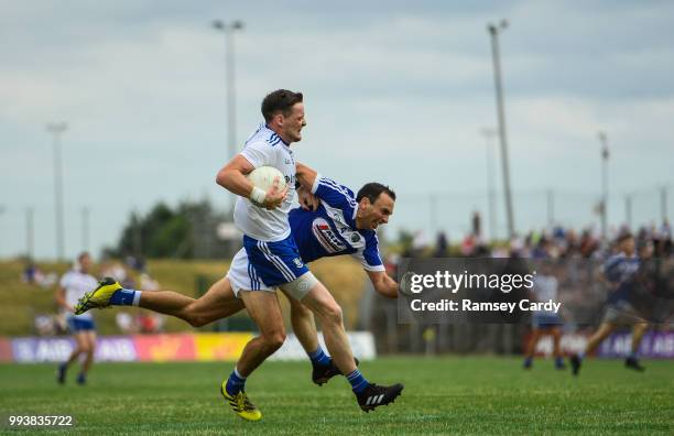 Navan , Ireland - 8 July 2018; Conor McManus of Monaghan is tackled by Gareth Dillon of Laois during the GAA Football All-Ireland Senior Championship...