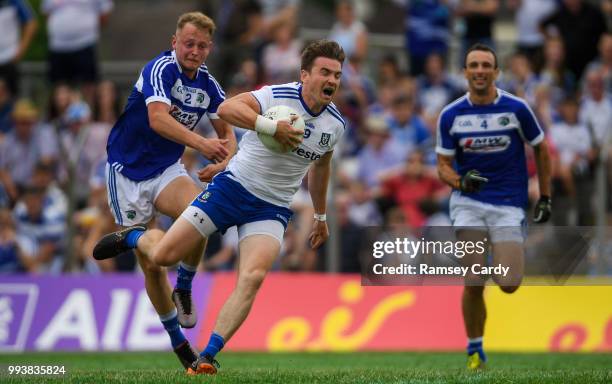 Navan , Ireland - 8 July 2018; Dessie Mone of Monaghan is tackled by Damien O'Connor of Laois during the GAA Football All-Ireland Senior Championship...