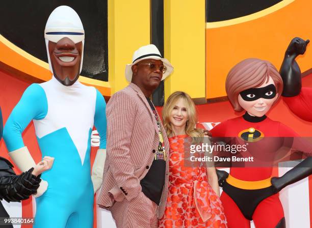 Samuel L. Jackson and Holly Hunter pose with characters at the UK Premiere of "Incredibles 2" at THE BFI Southbank on July 8, 2018 in London, England.