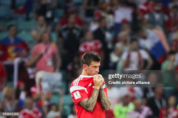 July 2018, Russia, Sotchi: Soccer: FIFA World Cup, Quarter Final: Russia vs Croatia Sotchi stadium. Fedor Smolov of Russia stands defeated. Photo:...