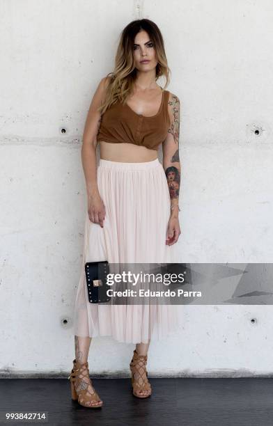 Maribel wears a Forever21 skirt, Stradivarius handbag and Berska dress during the Mercedes Benz Fashion Week Spring/Summer 2019 at IFEMA onon July 8,...