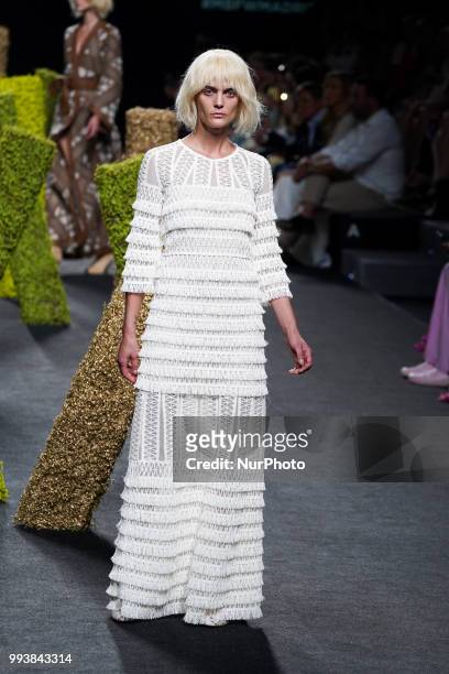 Model presents a creation by Spanish Teresa Helbig at the fashion show at the Mercedes-Benz Fashion Week Madrid Spring-Summer 2019, in IFEMA Madrid,...