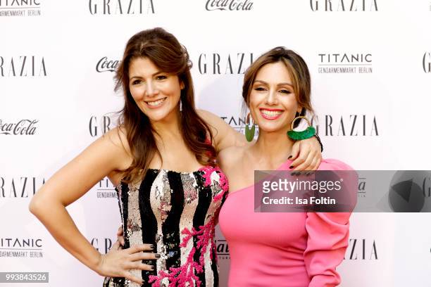 Sedef Ayguen and German presenter Nazan Eckes during the Grazia Pink Hour at Titanic Hotel on July 4, 2018 in Berlin, Germany.