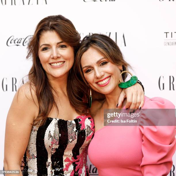 Sedef Ayguen and German presenter Nazan Eckes during the Grazia Pink Hour at Titanic Hotel on July 4, 2018 in Berlin, Germany.