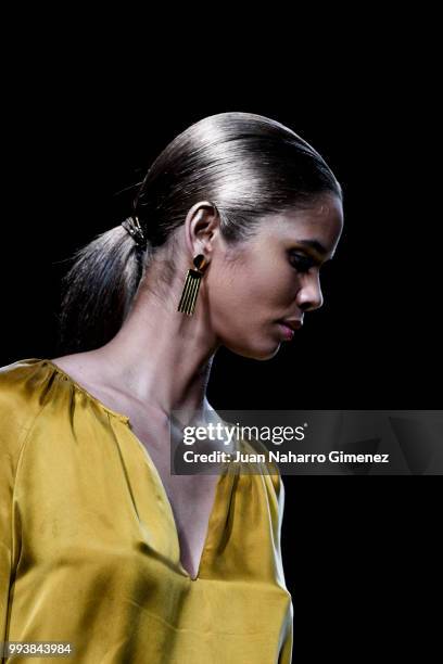 Model walks the runway at the Miguel Marinero show during the Mercedes-Benz Fashion Week Madrid Spring/Summer 2019 at IFEMA on July 8, 2018 in...