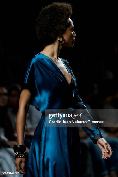 Model walks the runway at the Miguel Marinero show during the Mercedes-Benz Fashion Week Madrid Spring/Summer 2019 at IFEMA on July 8, 2018 in...