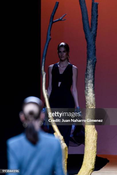 Model walks the runway at the Miguel Marinero show during the Mercedes-Benz Fashion Week Madrid Spring/Summer 2019 at IFEMA on July 8, 2018 in...