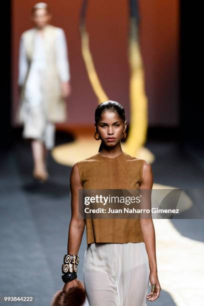 Model walks the runway at the Miguel Marinero show during the Mercedes-Benz Fashion Week Madrid Spring/Summer 2019 at IFEMA on July 8, 2018 in...