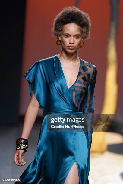 Model presents a creation by Spanish Miguel Marinero at the fashion show at the Mercedes-Benz Fashion Week Madrid Spring-Summer 2019, in IFEMA...