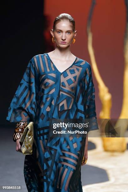 Model presents a creation by Spanish Miguel Marinero at the fashion show at the Mercedes-Benz Fashion Week Madrid Spring-Summer 2019, in IFEMA...