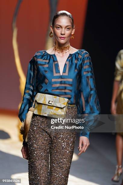 Model presents a creation by Spanish Miguel Marinero at the fashion show at the Mercedes-Benz Fashion Week Madrid Spring-Summer 2019, in IFEMA...