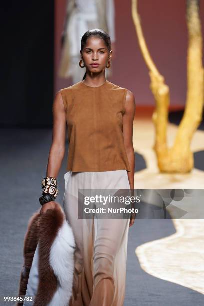 Model presents a creation by Spanish Miguel Marinero at the fashion show at the Mercedes-Benz Fashion Week Madrid Spring-Summer 2019, in IFEMA...