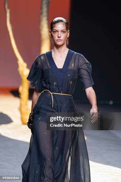 Model presents a creation by Spanish Miguel Marinero at the fashion show at the Mercedes-Benz Fashion Week Madrid Spring-Summer 2019, in IFEMA...