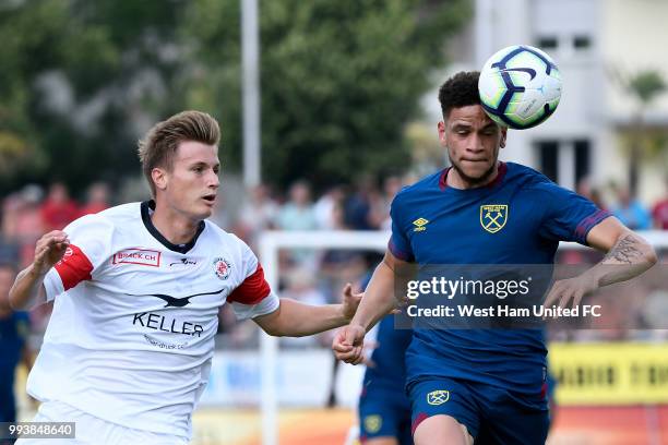 Marcus Browne of West Ham tackles Tobias Schaettin of FC Winterthur during the preseason friendly between FC Winterthur and West Ham United on July...