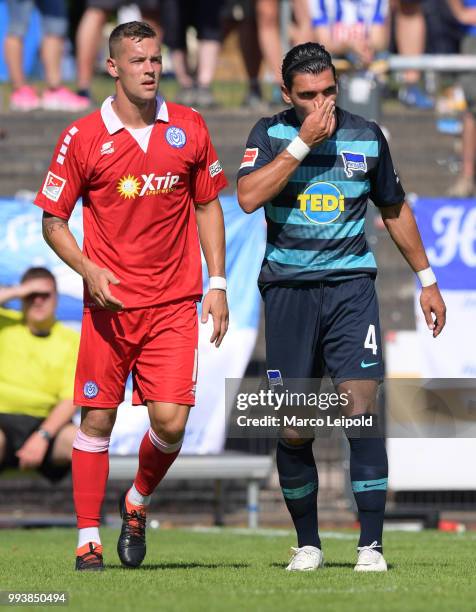 Stanislav Iljutcenko of MSV Duisburg and Karim Rekik of Hertha BSC during the game between Hertha BSC against MSV Duisburg at the Mondpalast-Arena on...