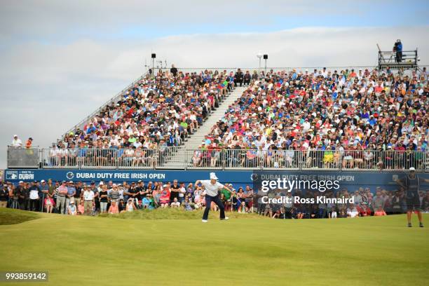 Russell Knox of Scotland celebrates holing a birdie putt on the 18th green during the final round of the Dubai Duty Free Irish Open at Ballyliffin...