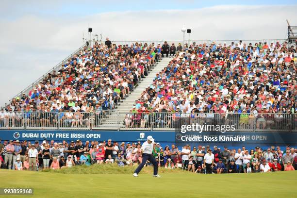 Russell Knox of Scotland celebrates holing a birdie putt on the 18th green during the final round of the Dubai Duty Free Irish Open at Ballyliffin...