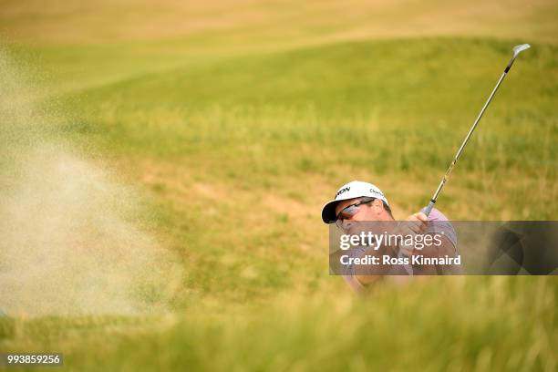 Ryan Fox of New Zealand hits from a bunker on the 15th hole during the final round of the Dubai Duty Free Irish Open at Ballyliffin Golf Club on July...