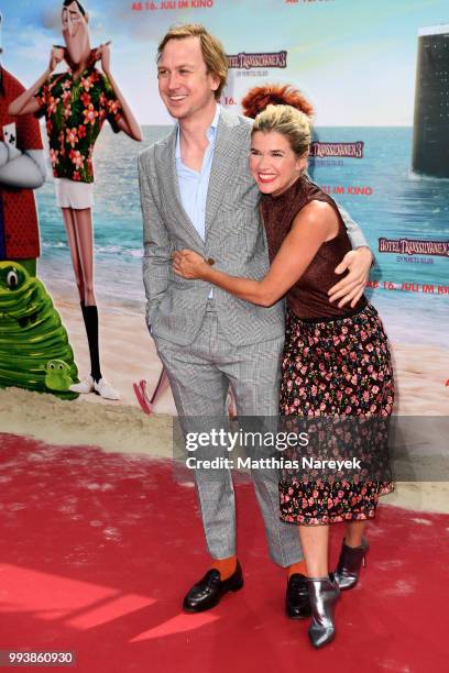 Lars Eidinger and Anke Engelke attend the 'Hotel Transsilvanien 3' premiere at CineStar on July 8, 2018 in Berlin, Germany.