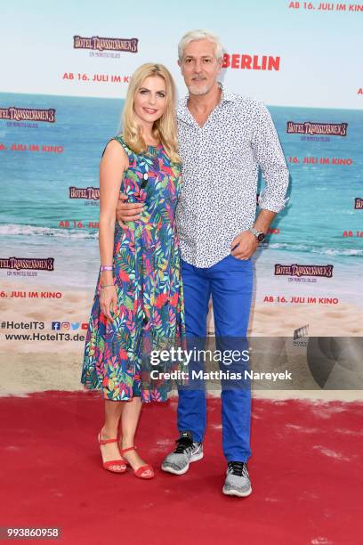 Tanja Buelter and her husband Nenad Drobnjak attend the 'Hotel Transsilvanien 3' premiere at CineStar on July 8, 2018 in Berlin, Germany.