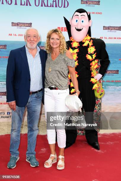 Dieter Hallervorden and Christiane Zander attend the 'Hotel Transsilvanien 3' premiere at CineStar on July 8, 2018 in Berlin, Germany.