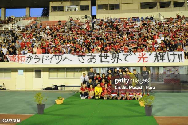 Hikaru Naomoto and players of Urawa Red Diamonds pose for photograph after the Nadeshiko League Cup Group A match between Urawa Red Diamonds and NTV...