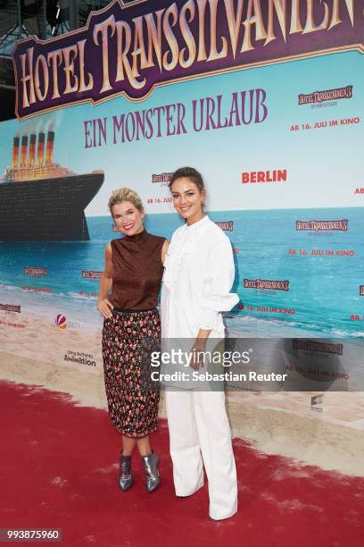 Anke Engelke and Janina Uhse attend the 'Hotel Transsilvanien 3' premiere at CineStar on July 8, 2018 in Berlin, Germany.