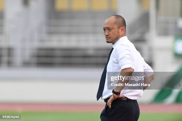 Takayoshi Ishihara,coach of Urawa Red Diamonds looks on during the Nadeshiko League Cup Group A match between Urawa Red Diamonds and NTV Beleza at...