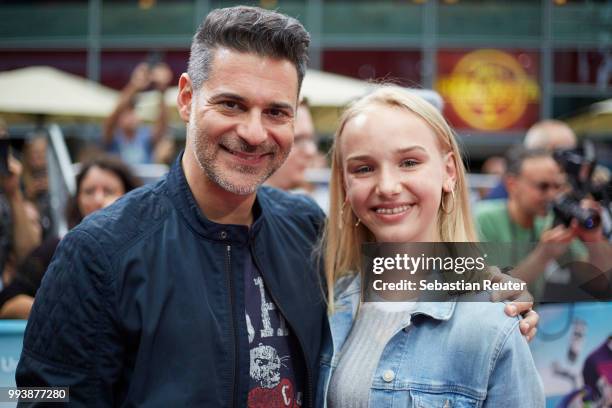 Rick Kavanian and Jule Hermann attend the 'Hotel Transsilvanien 3' premiere at CineStar on July 8, 2018 in Berlin, Germany.