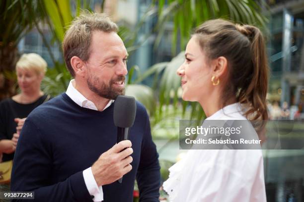 Steven Gaetjen and Janina Uhse attend the 'Hotel Transsilvanien 3' premiere at CineStar on July 8, 2018 in Berlin, Germany.