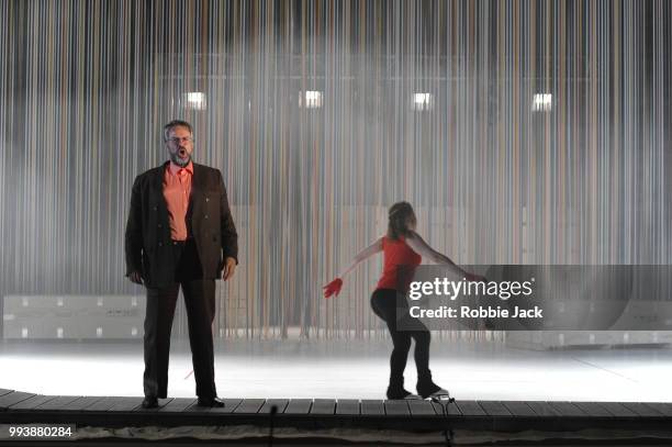 Grant Doyle as Enric and Alice Poggio as Nuria in David Sawer's The Skating Rink directed by Stewart Laing and conducted by Garry Walker at...