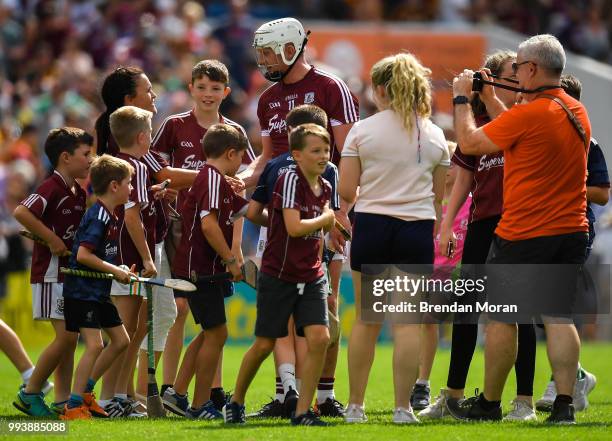 Thurles , Ireland - 8 July 2018; Joe Canning of Galway with young fans after the Leinster GAA Hurling Senior Championship Final Replay match between...