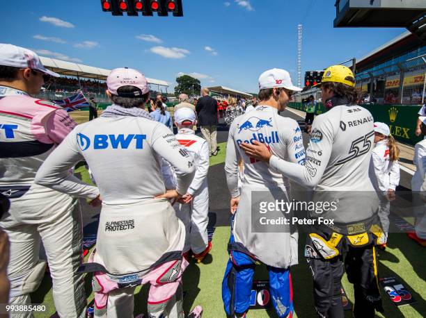 Esteban Ocon of France and Sahara Force India, Sergio Perez of Mexico and Sahara Force India , Pierre Gasly of Scuderia Toro Rosso and France and...