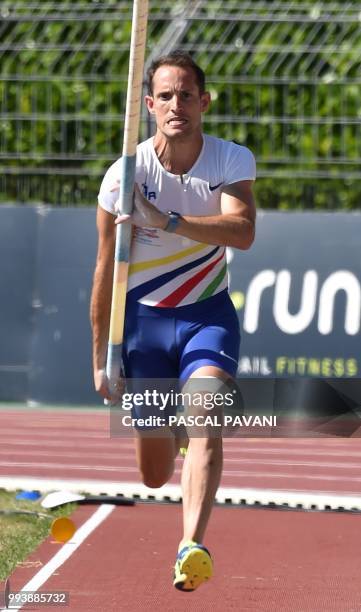 France's Renaud Lavillenie competes in the men's pole vault final during the French Elite Athletics Championships in Albi, south-western France on...