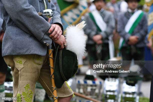 Men in traditional Bavarian costums attend a catholic service on the occasion of the 125th anniversary of the local Gebirgstrachten-Erhaltungsverein...