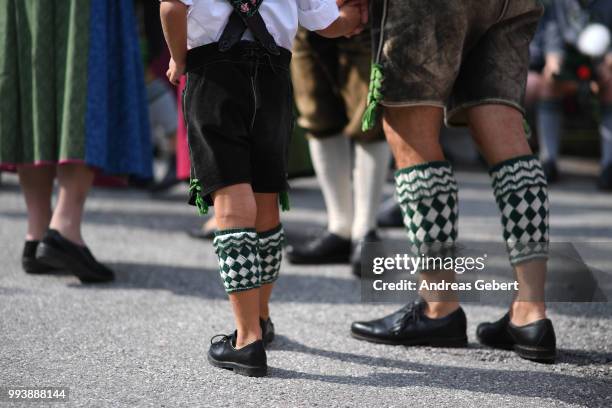 People attend a catholic service on the occasion of the 125th anniversary of the local Gebirgstrachten-Erhaltungsverein Murnau on July 8, 2018 in...