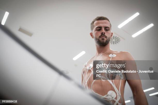 Miralem Pjanic of Juventus attends medical tests at Jmedical on July 8, 2018 in Turin, Italy.