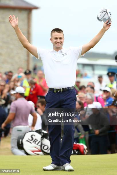 Russell Knox of Scotland celebrates his victory on the 18th green during a playoff at the end of the final round of the Dubai Duty Free Irish Open at...