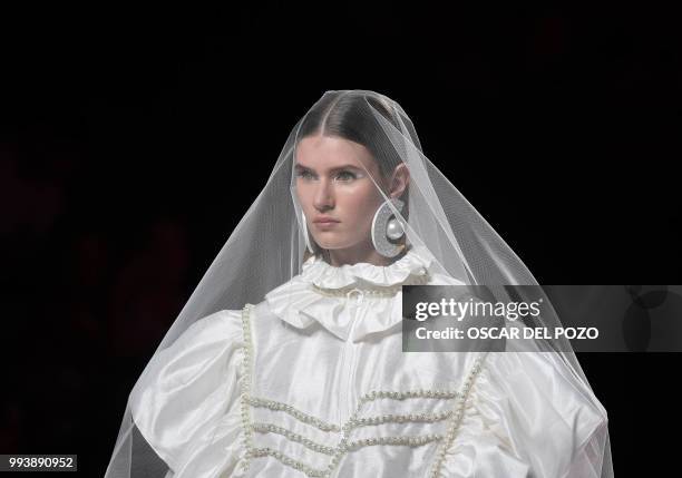 Model displays an outfit of Spanish designer Maria Escote Spring/Summer 2019 collection during the Madrid's Mercedes Benz Fashion Week on July 08,...