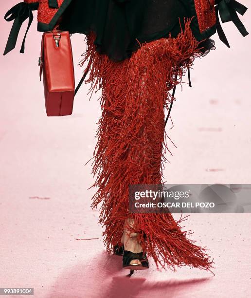 Model displays an outfit of Spanish designer Maria Escote Spring/Summer 2019 collection during the Madrid's Mercedes Benz Fashion Week on July 08,...